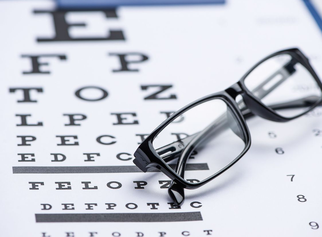 Spectacles in black color kept on a sheet